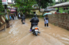 Heavy rain throws city out of gear; Met department warns of more rains